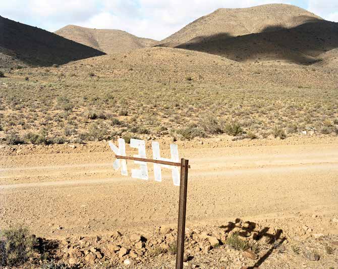 Farmer's sign for Gate (Hek). Near Rammetjieskraal, between Lainsburg and Prince Albert. Western Cape.28 May 2004 by David Goldblatt at Annandale Galleries