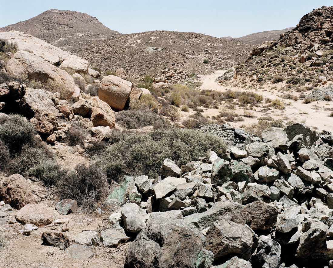 Copper-bearing rocks, near the workings started by Simon Van Der Stel governor of the Cape, during an expedition in 1650. Carlousberg. Namaqualand, Northern Cape. 1 January 2004 by David Goldblatt at Annandale Galleries