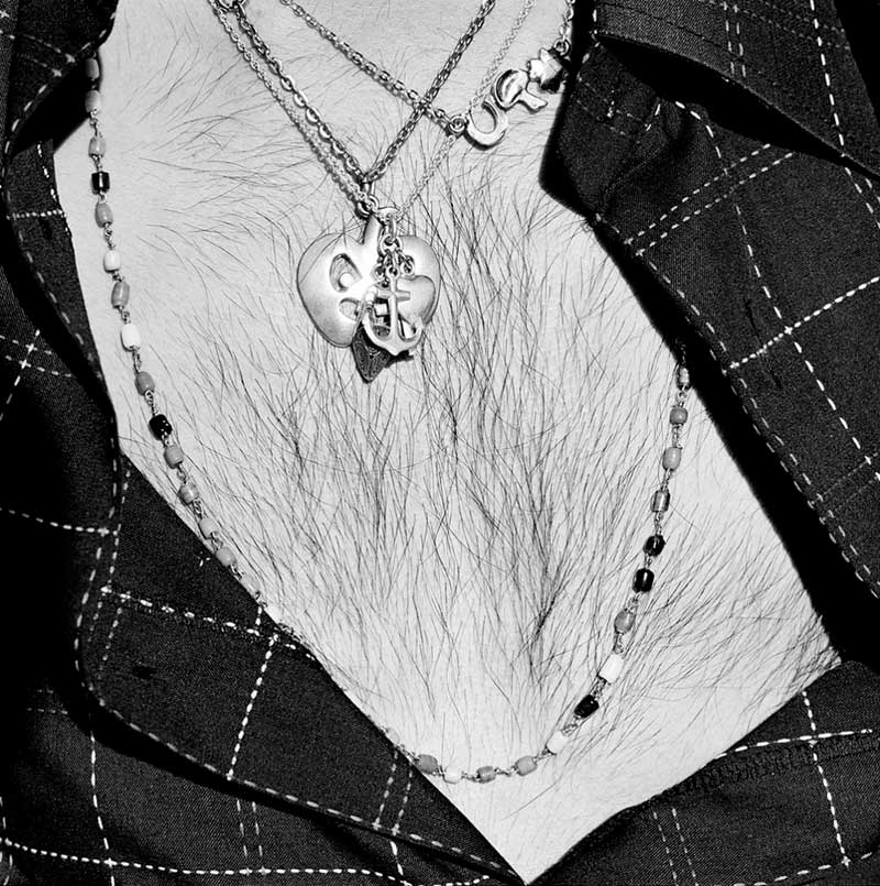 Man with necklaces. Joubert Park, Johannesburg. 1975 by David Goldblatt at Annandale Galleries